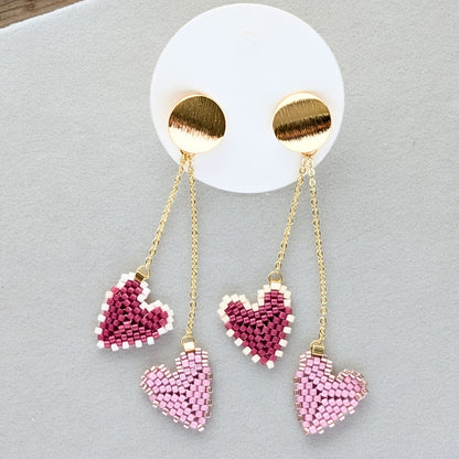 Amor øreringe – Hjerteformede Miyuki-øreringe i bevægelse