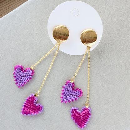 Amor øreringe – Hjerteformede Miyuki-øreringe i bevægelse